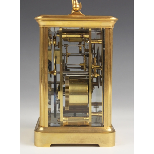 688 - A brass cased carriage clock, by Henry Marc Paris, late 19th/early 20th century, the bevelled glass ... 