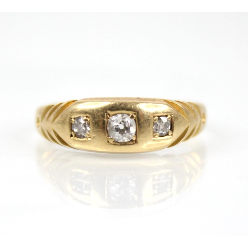 69 - A Victorian diamond 18ct gold ring, the central old cut diamond measuring 2.7mm x 2.7mm x 1.95mm, wi... 