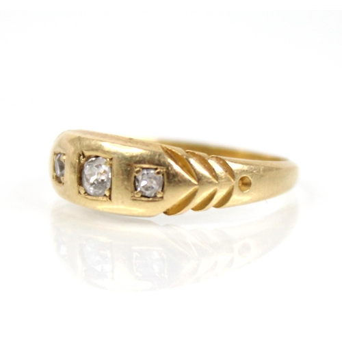 69 - A Victorian diamond 18ct gold ring, the central old cut diamond measuring 2.7mm x 2.7mm x 1.95mm, wi... 