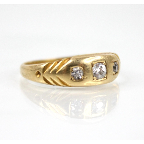 69 - A Victorian diamond 18ct gold ring, the central old cut diamond measuring 2.7mm x 2.7mm x 1.95mm, wi... 