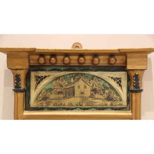 698 - A Regency pier mirror, the rectangular mirror plate below a verre eglomise style cottage frieze flan... 