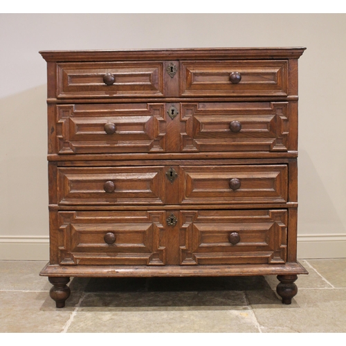 726 - An oak straight front two section chest of drawers, late 17th century, the twin plank moulded top ab... 