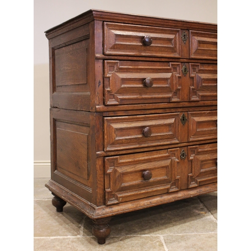 726 - An oak straight front two section chest of drawers, late 17th century, the twin plank moulded top ab... 