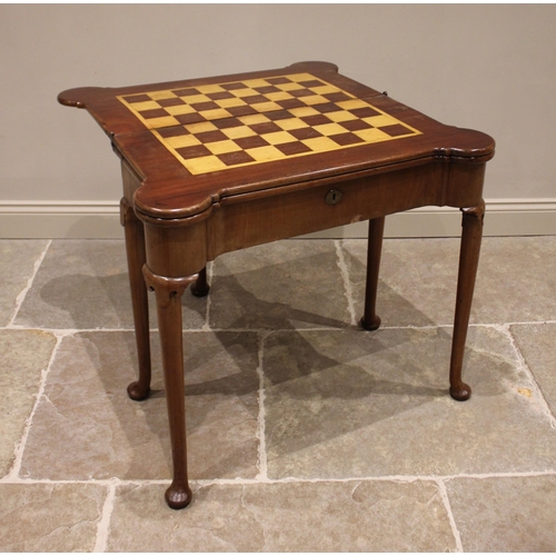 733 - A George II mahogany triple fold over combination games and card table, the rectangular folding top ... 