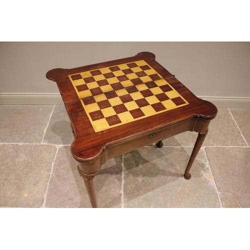 733 - A George II mahogany triple fold over combination games and card table, the rectangular folding top ... 