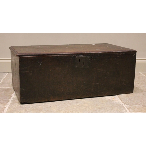 736 - A 17th century oak table top coffer/carriage box of plain rectangular proportions with hinged cover ... 