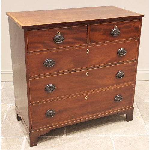 739 - An early 19th century mahogany chest of drawers, the rectangular satinwood cross banded top above an... 