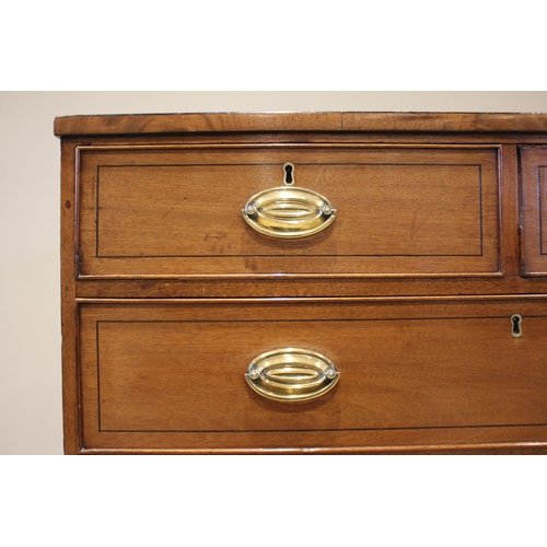 749 - A late Regency mahogany chest of drawers, the rectangular top above an arrangement of two short and ... 