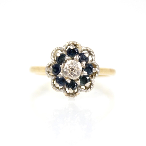 75 - An early 20th century sapphire and diamond floral cluster ring, the central single cut diamond set t... 