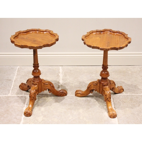 775 - A pair of Chippendale style yew wood wine tables, late 20th century, each with a pie crust shaped to... 