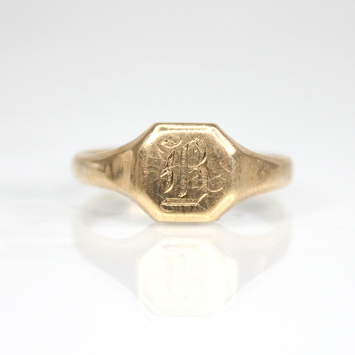 79 - A 9ct gold signet ring, the octagonal head engraved with monogrammed initial ‘B’, continuing to tape... 