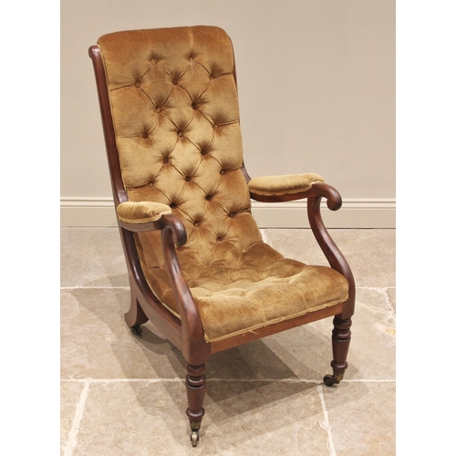 810 - A Victorian mahogany framed and upholstered open armchair, the curved button back and seat, enclosed... 