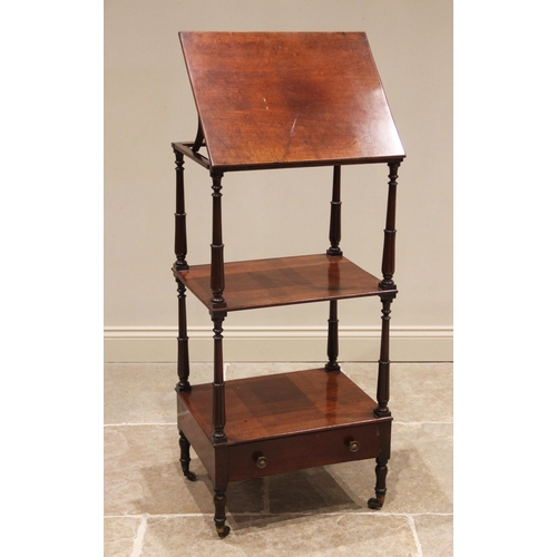 813 - A mahogany three tier whatnot with adjustable reading slope, 19th century, the rectangular top enclo... 