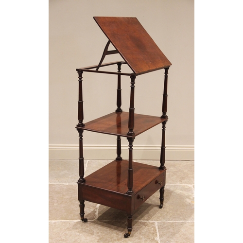 813 - A mahogany three tier whatnot with adjustable reading slope, 19th century, the rectangular top enclo... 