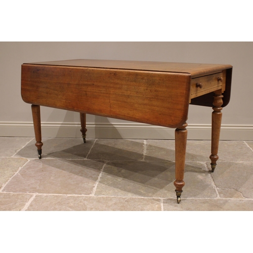 828 - A Victorian mahogany Pembroke table, the rounded rectangular drop leaf top above a pair of opposing ... 