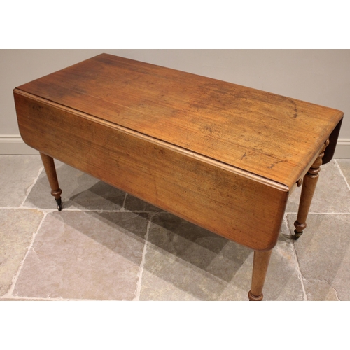 828 - A Victorian mahogany Pembroke table, the rounded rectangular drop leaf top above a pair of opposing ... 