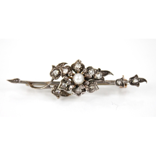 83 - A Victorian and later diamond and pearl floral spray brooch, the central floral head set with a cult... 