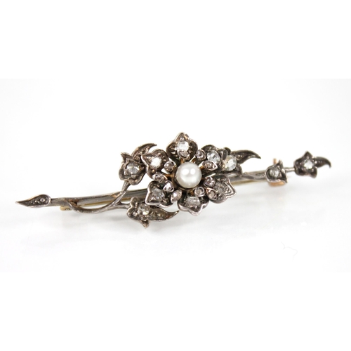 83 - A Victorian and later diamond and pearl floral spray brooch, the central floral head set with a cult... 