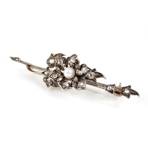 83 - A Victorian and later diamond and pearl floral spray brooch, the central floral head set with a cult... 