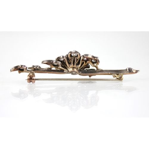 83 - A Victorian and later diamond and pearl floral spray brooch, the central floral head set with a cult... 