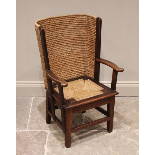 839 - An oak and skep work Orkney chair, early 20th century, the typical concave back rest extending to ou... 