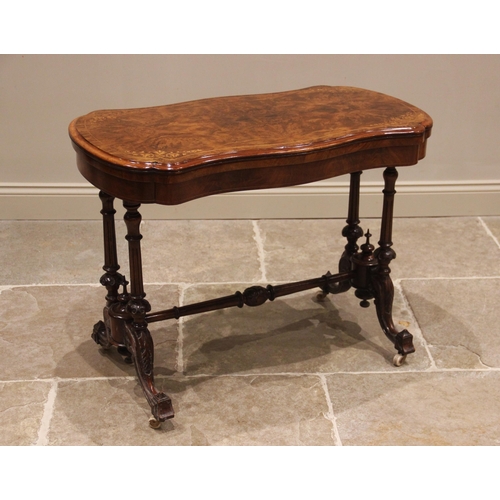 840 - A Victorian burr walnut serpentine card table, the quarter veneered moulded top inlaid with stringin... 