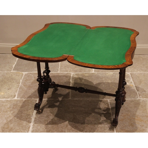 840 - A Victorian burr walnut serpentine card table, the quarter veneered moulded top inlaid with stringin... 