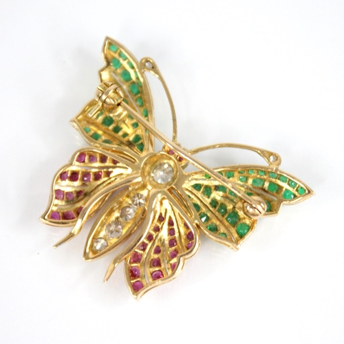 85 - A diamond, ruby and emerald set butterfly brooch, the body set with five old cut diamonds, with ruby... 