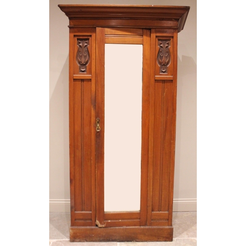 865 - An Art Nouveau satin walnut bachelor's single wardrobe, Timberlins Ltd, the single mirror door flank... 