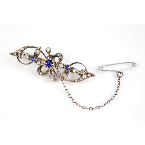 87 - A Victorian sapphire and diamond floral bar brooch, comprising a central round mixed cut sapphire (u... 