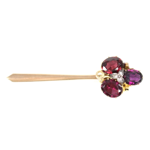 91 - A Victorian and later garnet and diamond brooch, comprising three oval mixed cut garnets, interspers... 