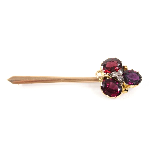 91 - A Victorian and later garnet and diamond brooch, comprising three oval mixed cut garnets, interspers... 