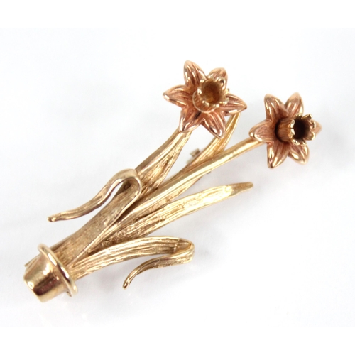 93 - A Clogau 9ct gold daffodil brooch, the daffodil heads modelled in rose gold, upon yellow gold stems ... 