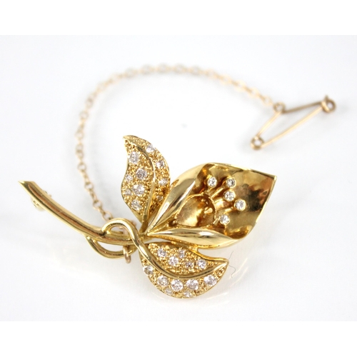 94 - An 18ct gold diamond set lily brooch, the plain polished shaped head with diamond set stamen (lackin... 