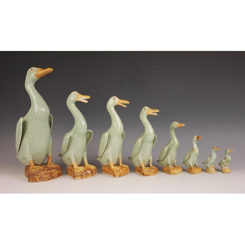 417 - A set of eight Chinese porcelain celadon glazed ducks, 20th century, each of graduated size, largest... 