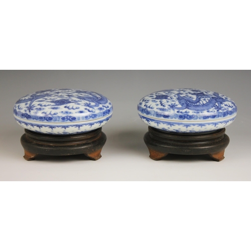 418 - A pair of Chinese porcelain blue and white boxes and covers, Qianlong seal mark, each circular box p... 