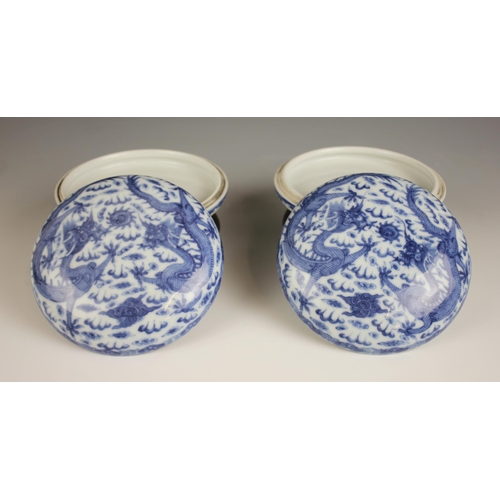 418 - A pair of Chinese porcelain blue and white boxes and covers, Qianlong seal mark, each circular box p... 