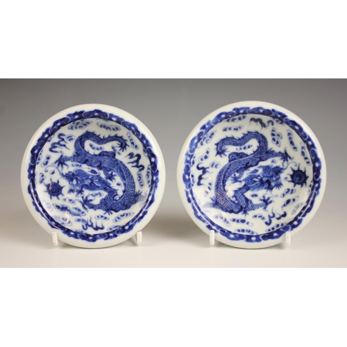 419 - A pair of Chinese porcelain blue and white dishes, Yongzheng seal mark, each decorated to the centre... 