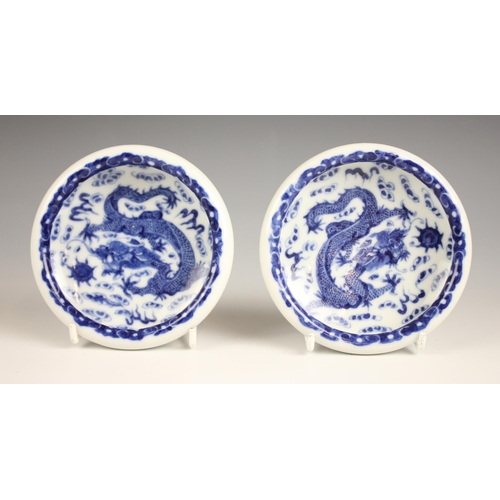 419 - A pair of Chinese porcelain blue and white dishes, Yongzheng seal mark, each decorated to the centre... 