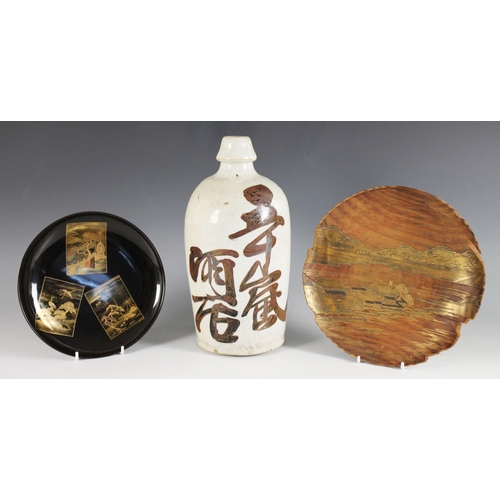 421 - A Japanese Tokkuri Sake bottle, with an all-over craquelure glaze, 27.5cm high, with a Japanese lacq... 