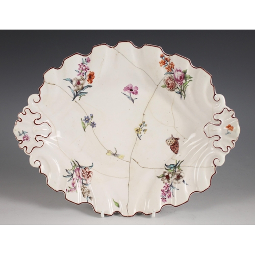 471 - A Chelsea porcelain silver shape dish, circa 1755, painted with scattered floral sprays, moths and i... 