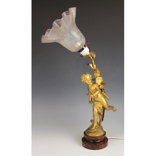 536 - A French gilt effect spelter table lamp, early 20th century, modelled as Cupid or Eros with his arro... 