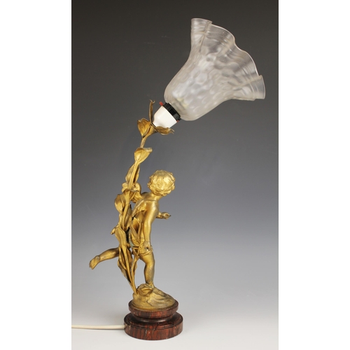 536 - A French gilt effect spelter table lamp, early 20th century, modelled as Cupid or Eros with his arro... 