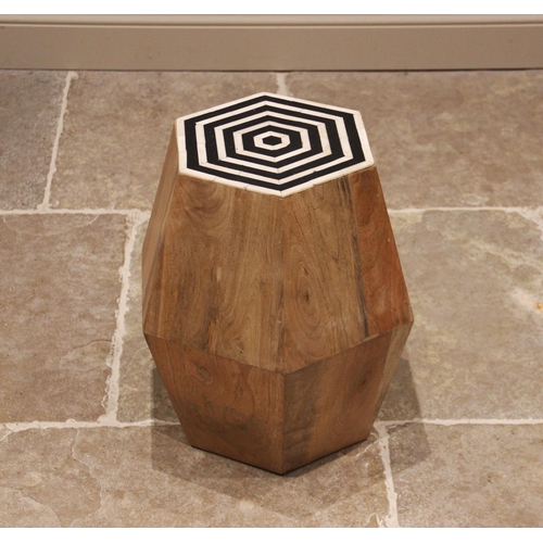 848 - A contemporary hardwood stool or plant stand, of tapering hexagonal form, with a composite black and... 