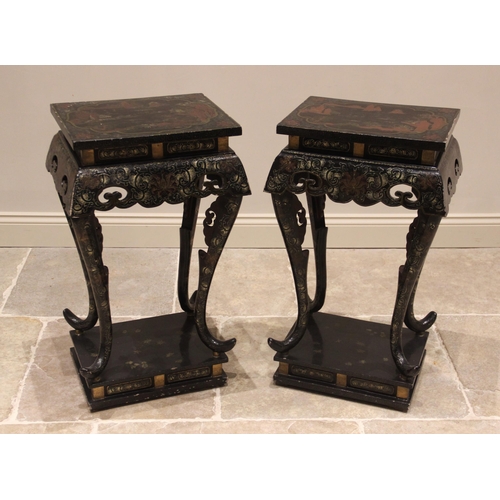 849 - A pair of Chinese lacquered urn stands, the rectangular tops gilt highlighted against a black ground... 