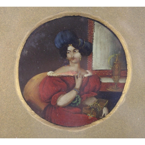 163 - Continental school (19th century),  
A tondo portrait miniature depicting a lady in blue hat holding... 