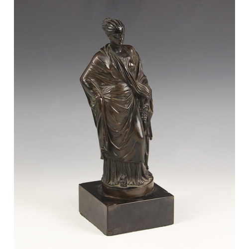 647 - A Grand Tour patinated bronze figure of a Grecian lady in classical robes, 19th century, modelled st... 