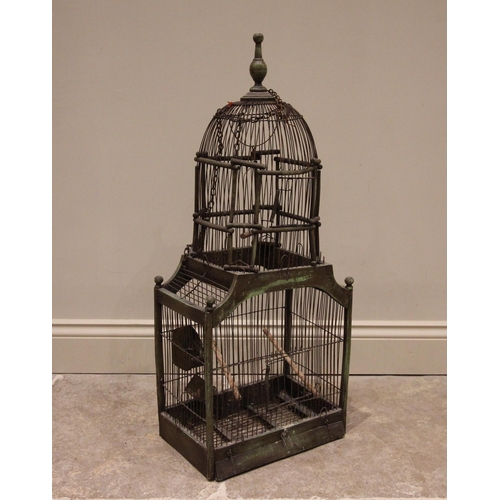 656 - An architectural stained wood and wire work bird cage, of domed form with hinged twin access, 85cm H... 