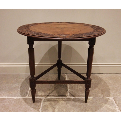 705 - A 17th century style oak triform drop leaf occasional table, early 20th century, the circular top wi... 