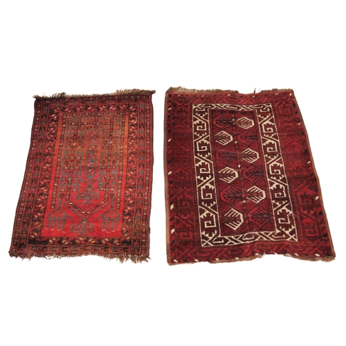 628 - A hand knotted Caucasian woollen prayer rug, in red black and ivory colourways, the stylised leaf pa... 